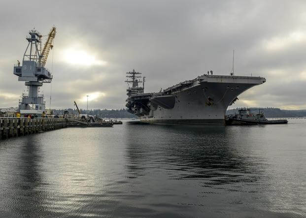 The Nimitz-class aircraft carrier USS Nimitz (CVN 68) arrives pierside at Naval Base Kitsap Bremerton. Nimitz is undergoing a planned incremental availability at Puget Sound Naval Shipyard and Intermediate Maintenance Facility where the ship will receive scheduled maintenance and upgrades. (U.S. Navy photo by Mass Communication Specialist 2nd Class Ryan J. Mayes/Released) The Nimitz-class aircraft carrier USS Nimitz (CVN 68) arrives pierside at Naval Base Kitsap Bremerton.