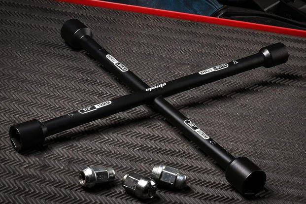 A cross-shaped lugnut wrench