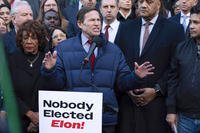 Sen. Richard Blumenthal, D-Conn., accompanied by other members of Congress, speaks during a rally against Elon Musk outside the Treasury Department in Washington.